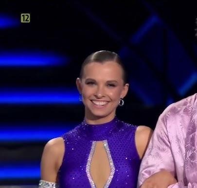Ola Filipek i Wojciech Kucina w dynamicznej pozie tanecznej na parkiecie